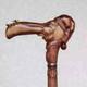 Walking cane Man in stocking cap with fly on the nose Hand carved walking stick