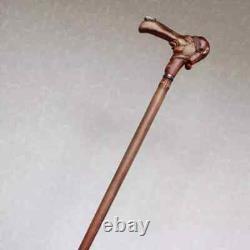 Walking cane Man in stocking cap with fly on the nose Hand carved walking stick