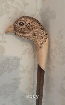 Walking stick / shooting / dress stick. Hand carved Hen Pheasant