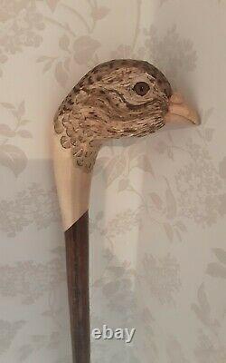 Walking stick / shooting stick / dress stick. Hand carved Hen Pheasant